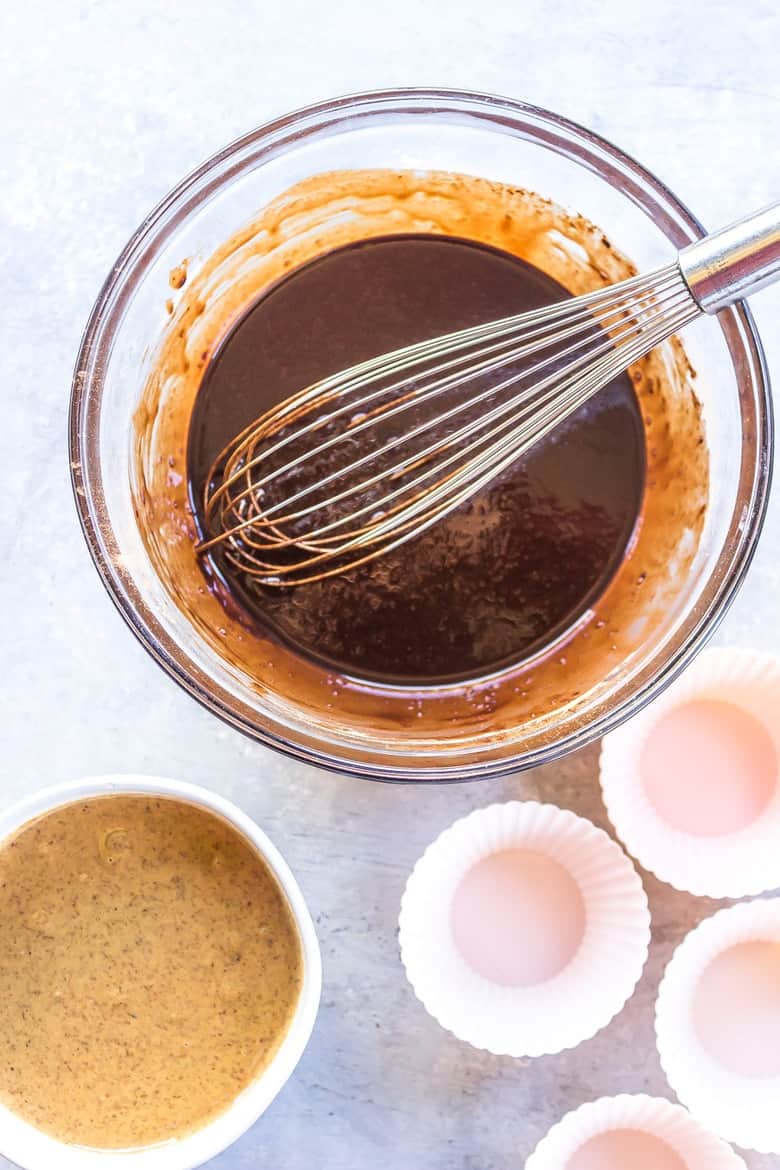 Overhead Shot Of Melted Chocolate In Bowl With Whisk