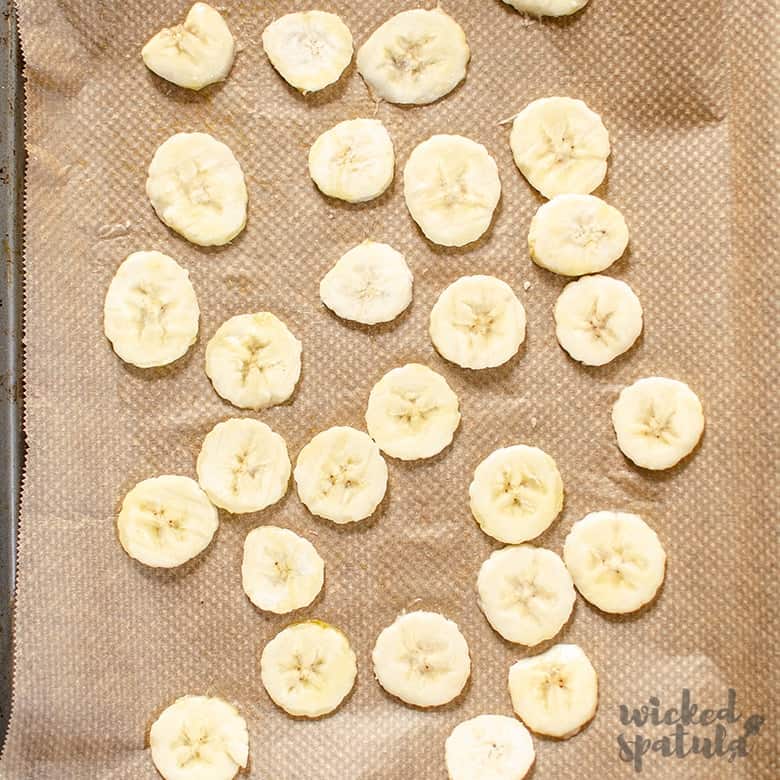 Plantain chips on a baking sheet