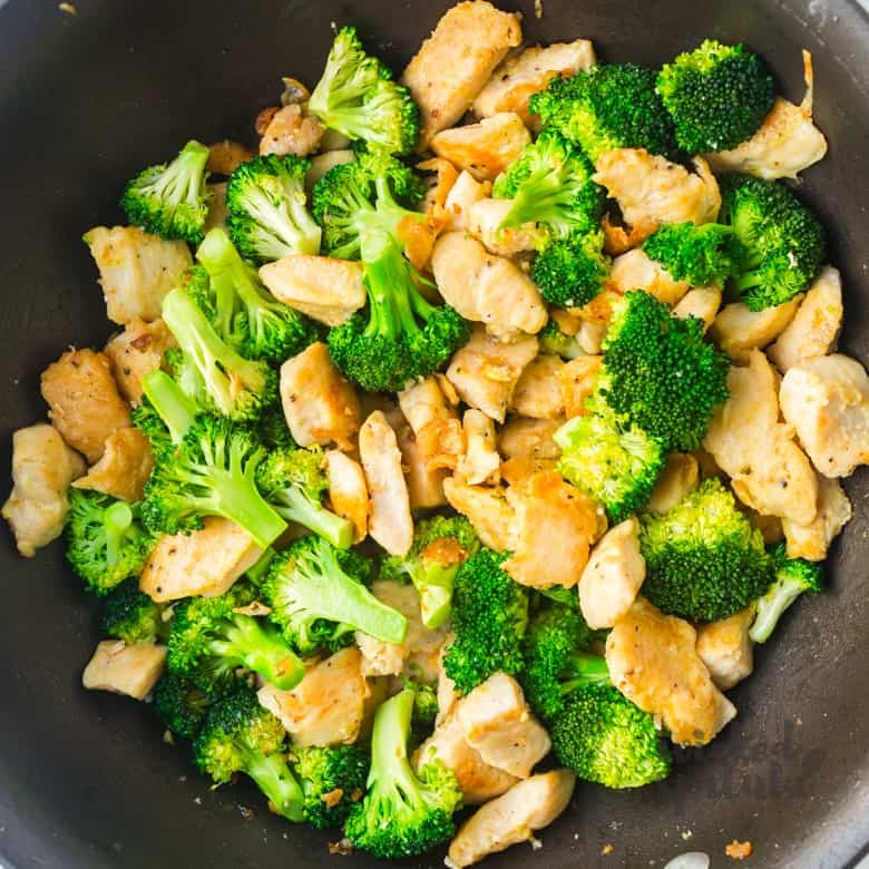 Paleo honey sesame chicken and broccoli in pan