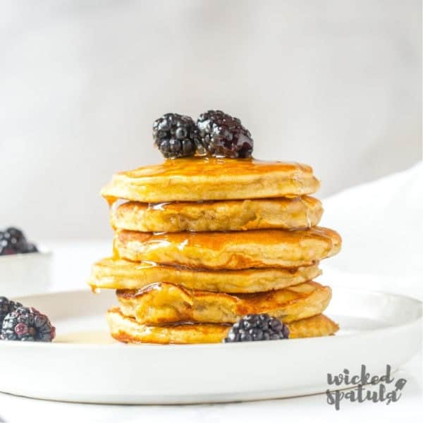 stack of paleo banana pancakes with blackberries