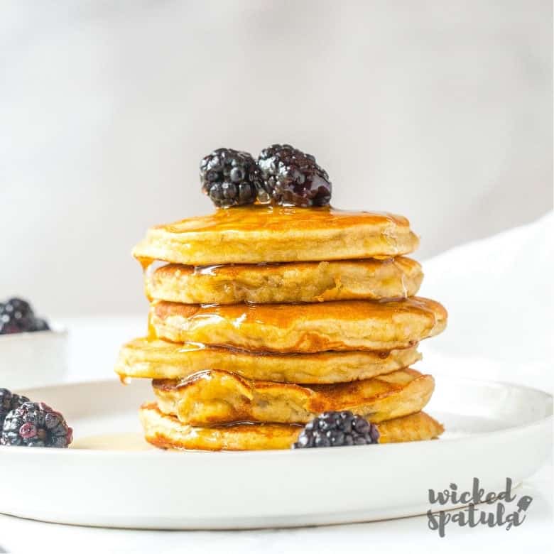 stack of paleo banana pancakes with blackberries