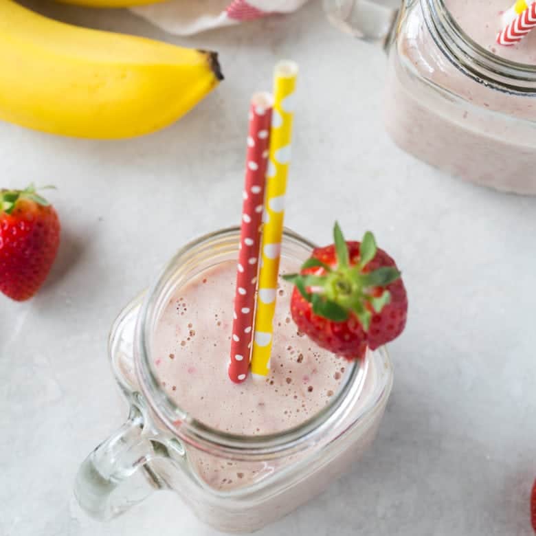 healthy strawberry banana smoothie overhead shot