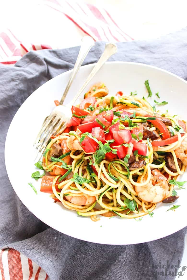 zucchini pasta recipe - in a bowl with vegetables and shrimp