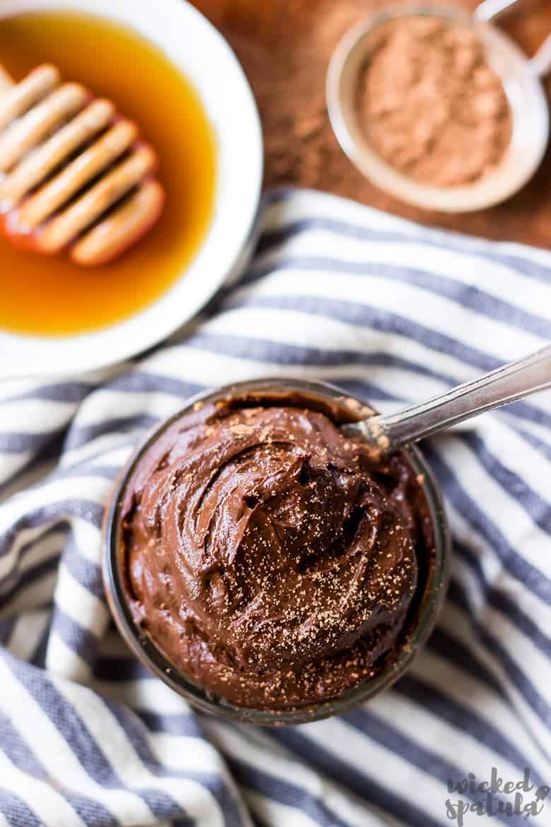 chocolate avocado pudding with sprinkle of cocoa powder