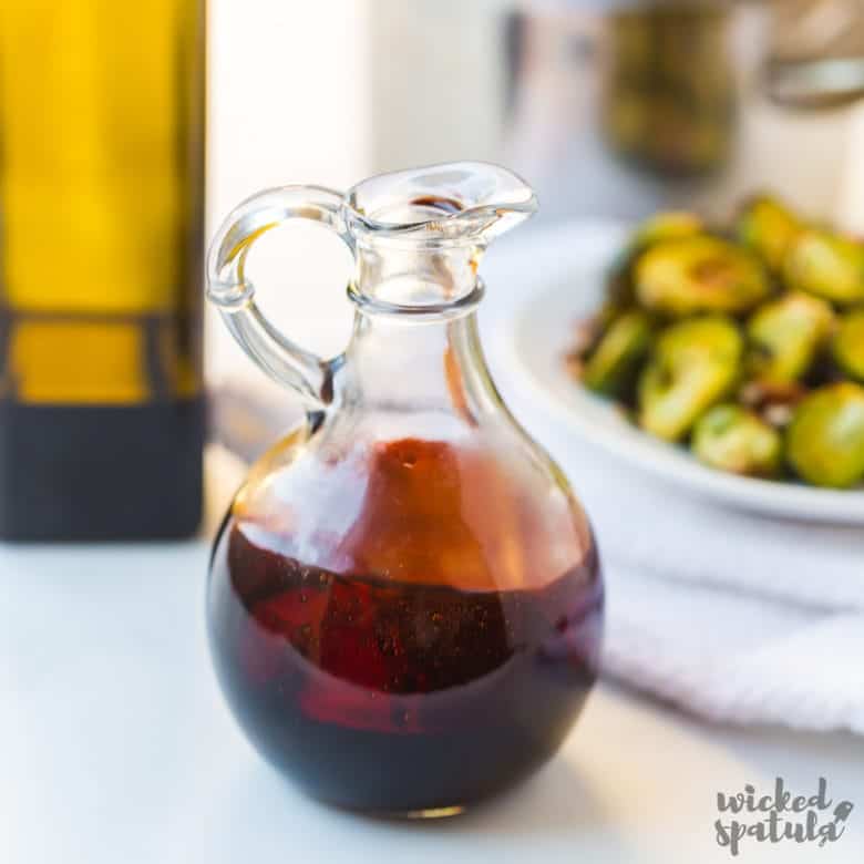 balsamic glaze in glass pitcher