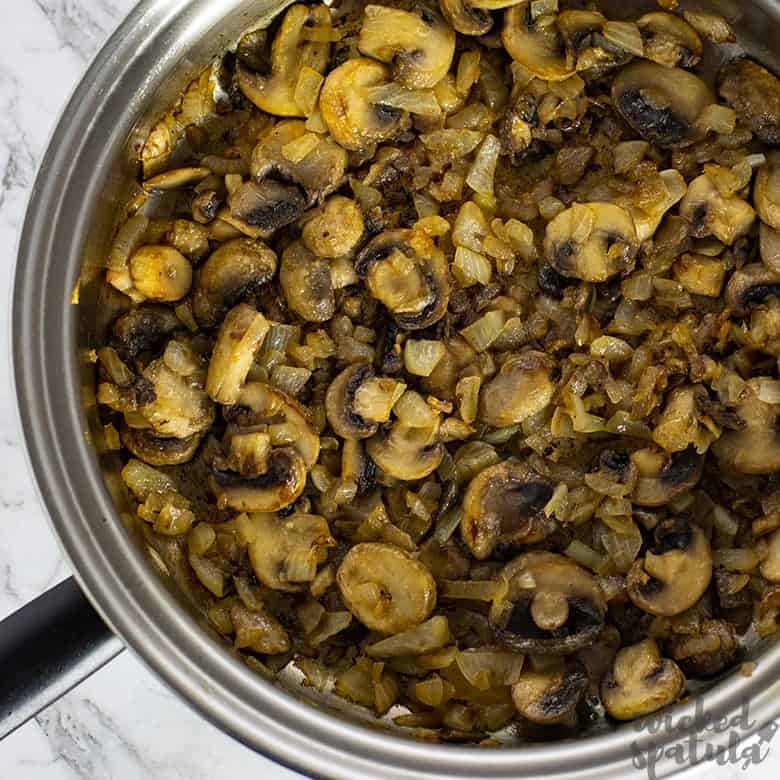 cooked mushrooms in pan