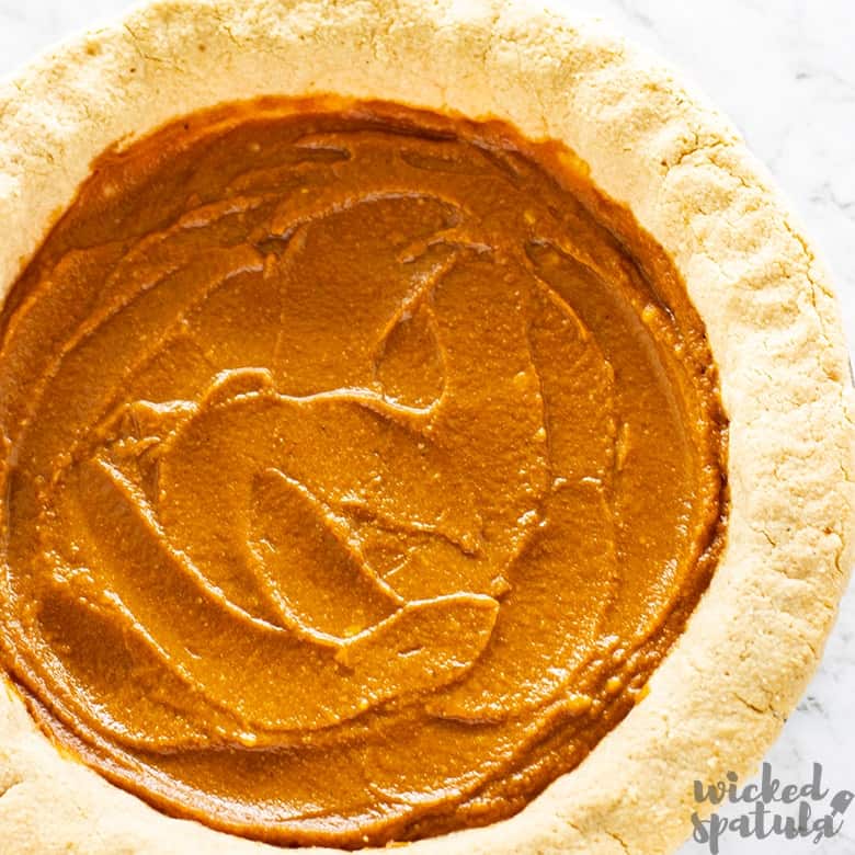paleo pumpkin pie recipe in crust ready to bake