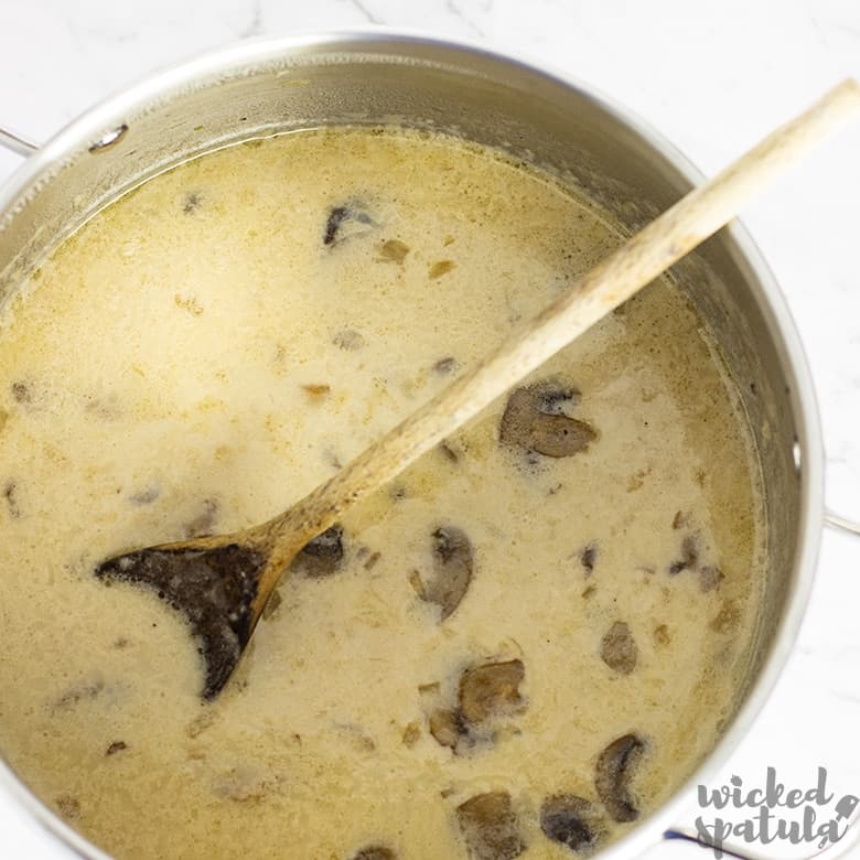 ingredients for dairy-free mushroom soup being stirred in