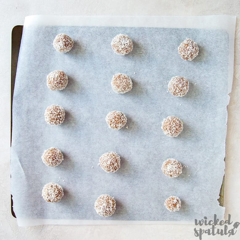 paleo vegan energy balls on parchment paper