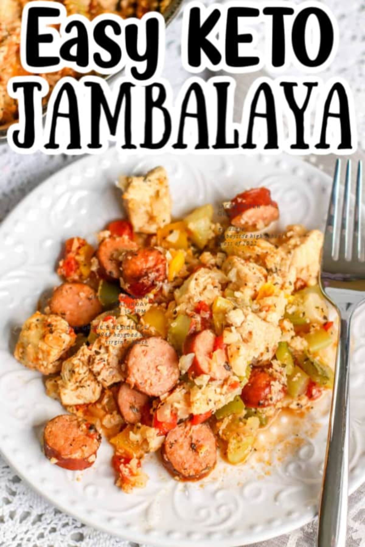 The text reads "Easy Keto Jambalaya". A white plate has a pile of jambalaya on it and a metal fork to the side